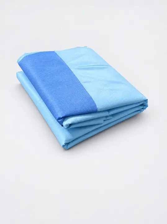 Folded surgical drape – darker blue reinforcement panel | Gefaltetes OP-Abdecktuch | Telo chirurgico piegato